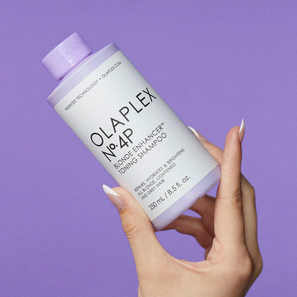Olaplex N 4P Blonde Enhancer Toning Shampoo Hand Model