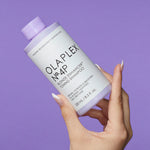 Olaplex N 4P Blonde Enhancer Toning Shampoo Hand Model
